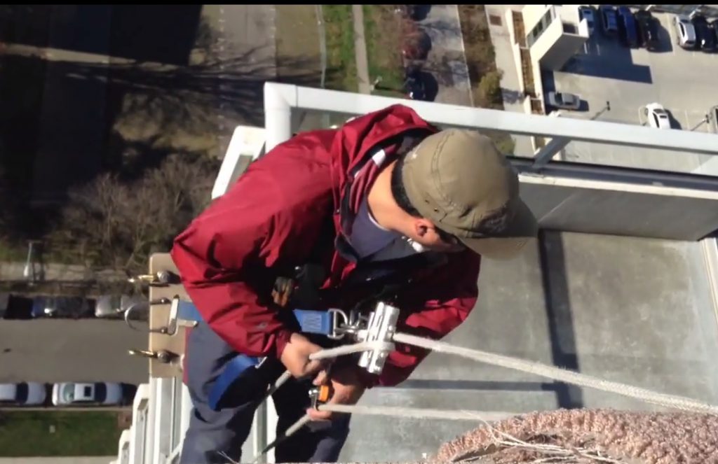 Cleaning Windows From the Top